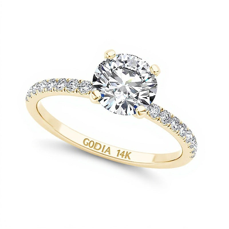 Solitär mit seitlichem Besatz mit Diamanten 1.0 CT. Gesamtgewicht in 14K Gelbgold