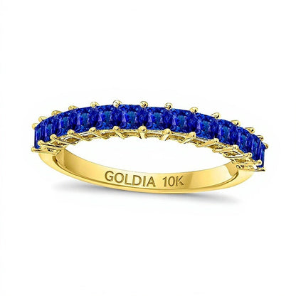 Memoire-Ring mit blauem Saphir im Princess-Schliff in 10K Gelbgold
