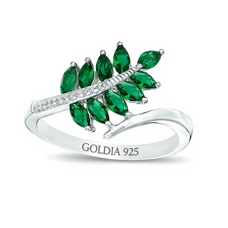 Bypass-Ring in Blattform mit Labor-Smaragd im Marquise-Schliff und Diamant-Besatz aus rhodiniertem Sterlingsilber