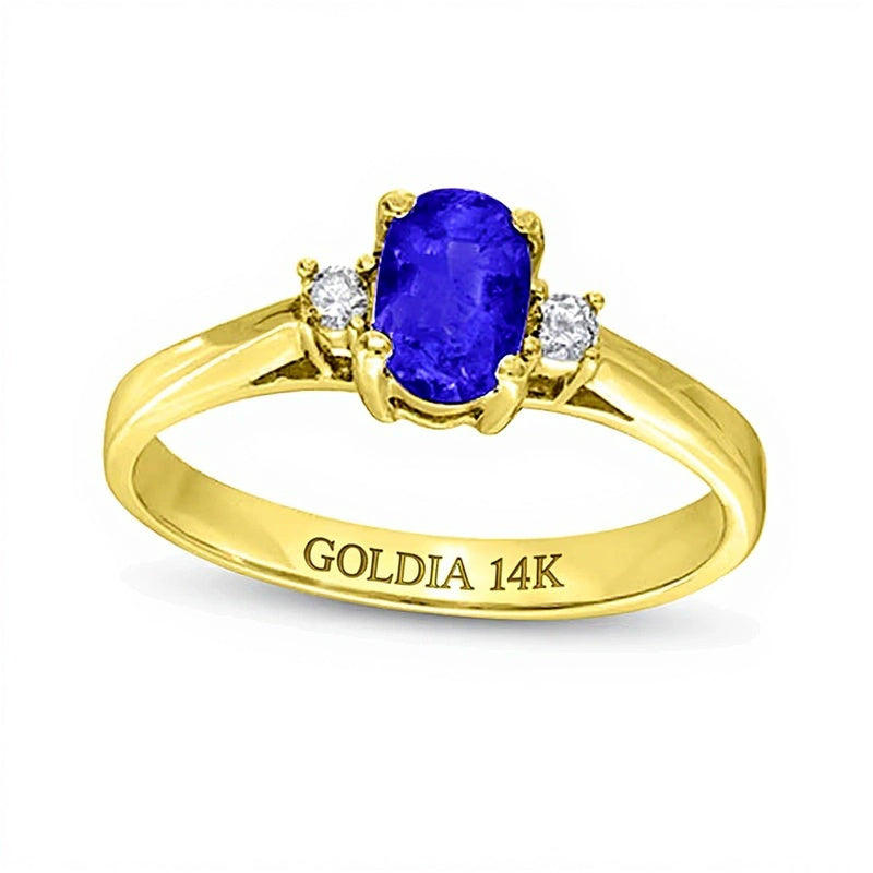 Solitär-Ring mit seitlichem Besatz mit ovalem Tansanit und 0,05 ct. Gesamtgewicht Diamanten in 14K Gelbgold