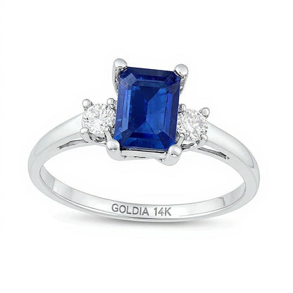 Dreistein-Ring mit blauem Saphir im Smaragdschliff und Diamanten 0,2 ct. Gesamtgewicht in 14K Weißgold