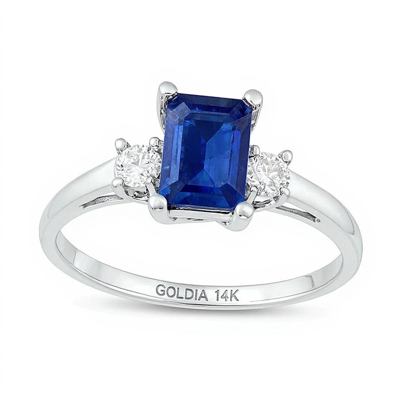 Dreistein-Ring mit blauem Saphir im Smaragdschliff und Diamanten 0,2 ct. Gesamtgewicht in 14K Weißgold