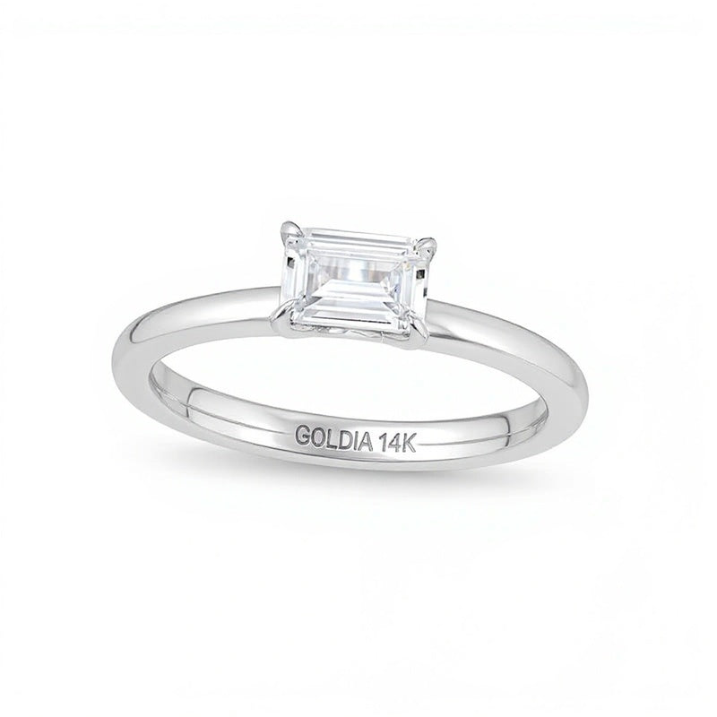 0,5 ct. Solitär-Ring mit Diamant im Smaragdschliff quer gefasst in 14K Weißgold (I/I2)