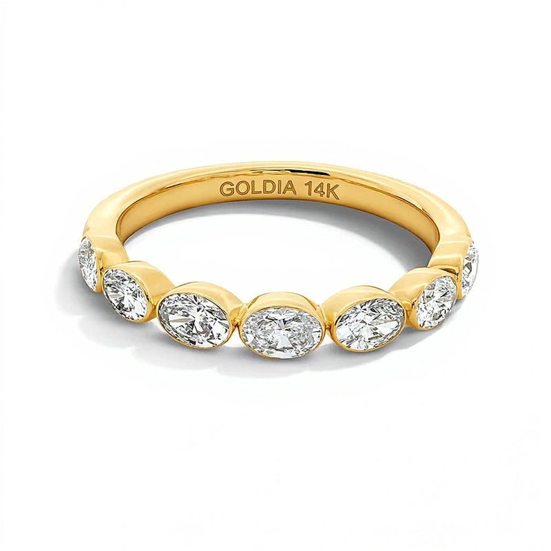 1.0 ct. Gesamtgewicht Memoire-Ring mit sieben ovalen Labordiamanten in Zargenfassung aus 14K Gelbgold (F/VS2)