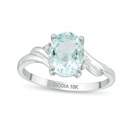 Ring mit ovalem Aquamarin und Diamant-Besatz in 10K Weißgold