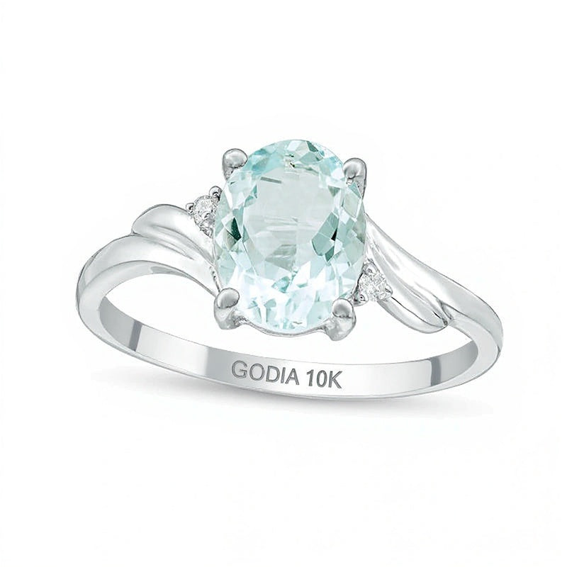 Ring mit ovalem Aquamarin und Diamant-Besatz in 10K Weißgold