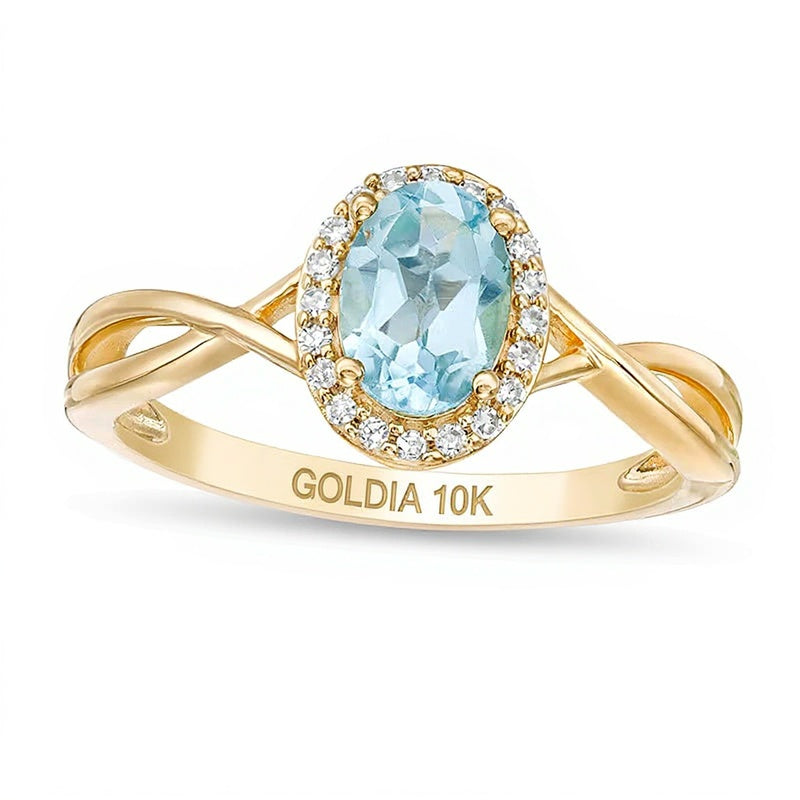 Fashion-Ring mit ovalem Swiss Blue Topaz und 0,07 ct. Gesamtgewicht Diamanten in 10K Gelbgold