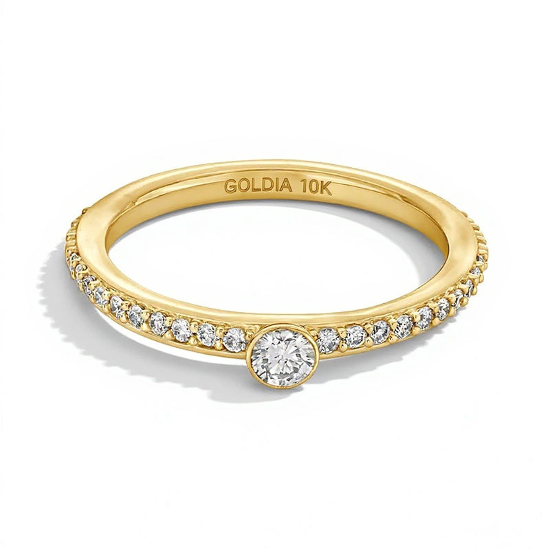 Memoire-Ring mit Diamanten 0,25 ct. Gesamtgewicht in Zargenfassung, stapelbar, aus 10K Gelbgold