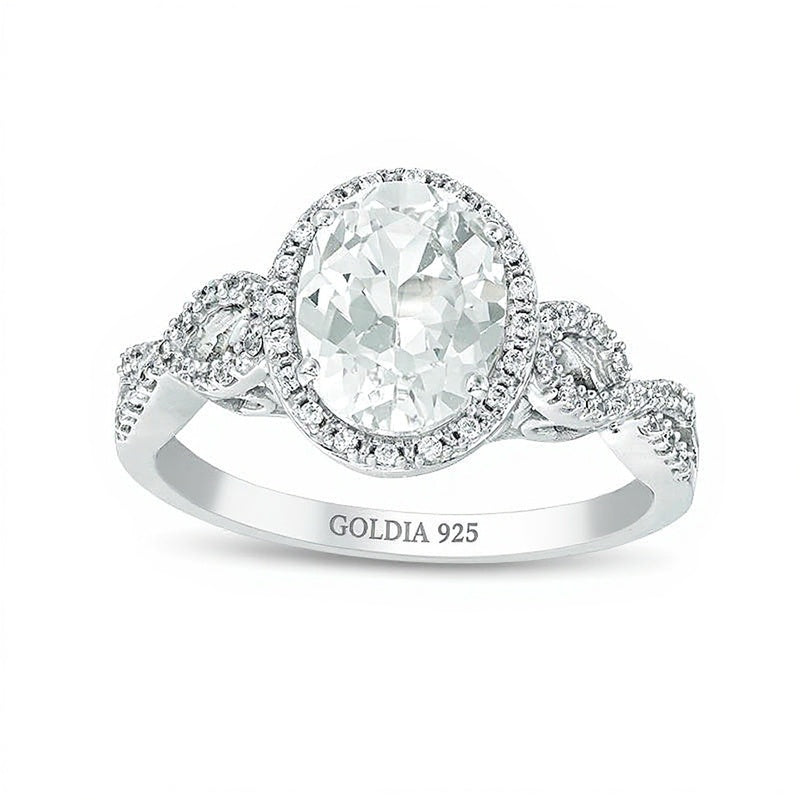 Verlobungsring für Damen mit ovalem, im Labor gezüchtetem weißem Saphir und Diamanten 0,17 ct. Gesamtgewicht im Halo aus rhodiniertem Sterlingsilber