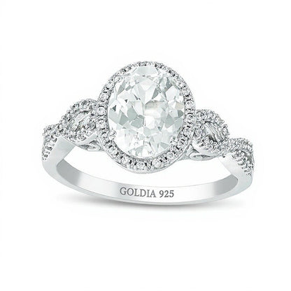 Verlobungsring für Damen mit ovalem, im Labor gezüchtetem weißem Saphir und Diamanten 0,17 ct. Gesamtgewicht im Halo aus rhodiniertem Sterlingsilber