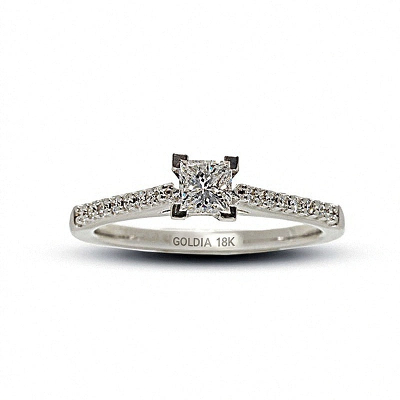 Solitär mit seitlichem Besatz mit Princess- und rund geschliffenen weißen Diamanten in 18K Weißgold, 0.5 ct. Gesamtgewicht