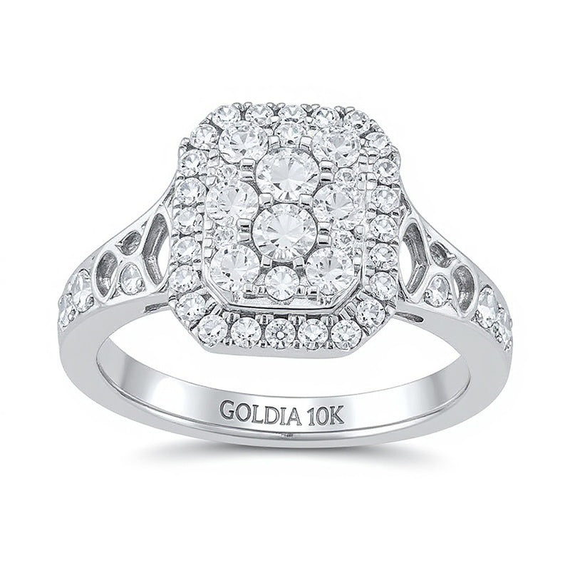 Verlobungsring mit Smaragd und mehreren Diamanten 1.25 ct. Gesamtgewicht in 10K Weißgold