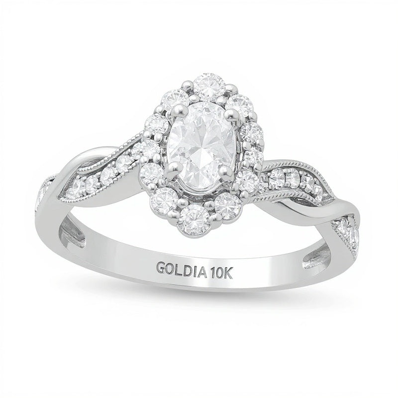 0,75 ct. Gesamtgewicht Verlobungsring im Vintage-Stil mit ovalem Diamant, Halo und gedrehtem Ring in 10K Weißgold