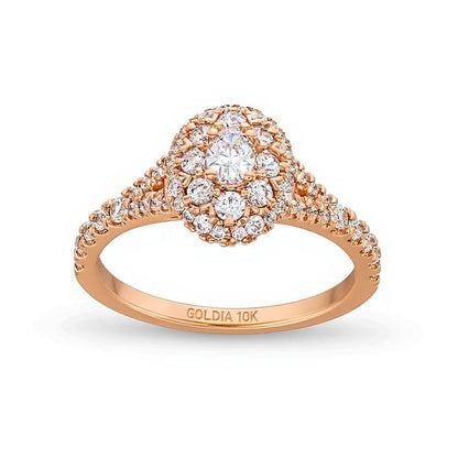 0.75 ct. Gesamtgewicht Verlobungsring mit ovalen und runden Diamanten und Split-Shank in 10K Roségold