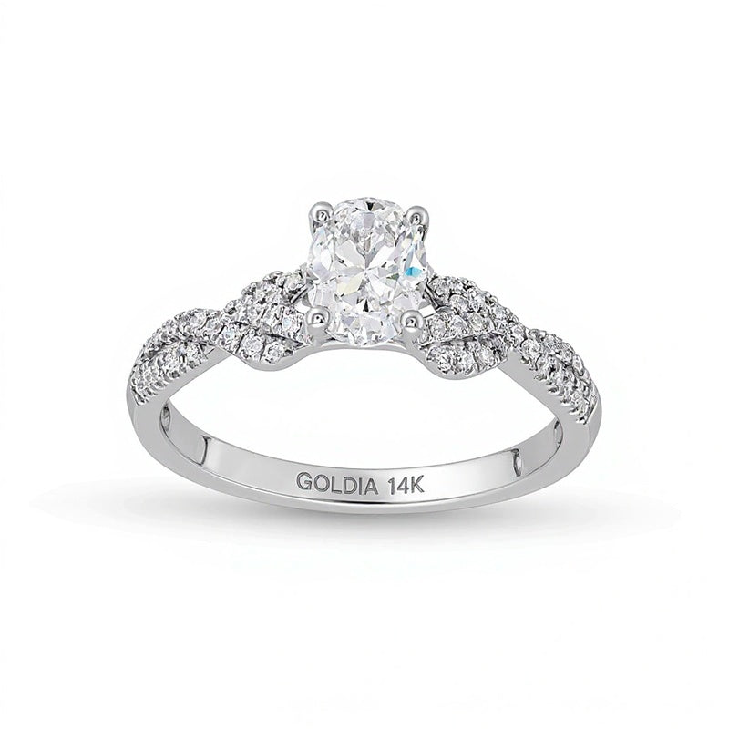 0,75 ct. Gesamtgewicht Verlobungsring Solitär mit seitlichem Besatz mit ovalem Diamant in 14K Weißgold