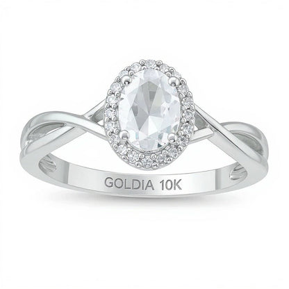 Ring mit ovalem Aquamarin und 0,07 ct. Gesamtgewicht Diamanten, Halo und gedrehter Ringschiene in 10K Weißgold