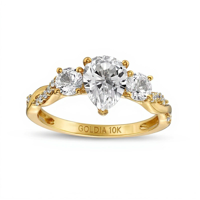 Dreistein-Ring für Damen mit tropfenförmigem weißem Labor-Saphir und 0,1 ct. Gesamtgewicht Diamanten in 10K Gelbgold