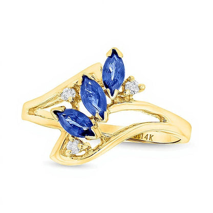 Dreistein-Ring mit blauem Saphir im Marquise-Schliff und Diamant-Besatz in 14K Gelbgold