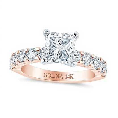2,5 ct. Gesamtgewicht Solitär mit seitlichem Besatz mit Diamanten im Princess- und Rundschliff in 14K Roségold (I/I2)