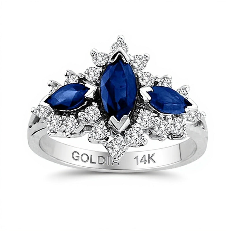 Dreistein-Ring mit blauem Saphir im Marquise-Schliff und 0,5 ct. Gesamtgewicht Diamanten in 14K Weißgold