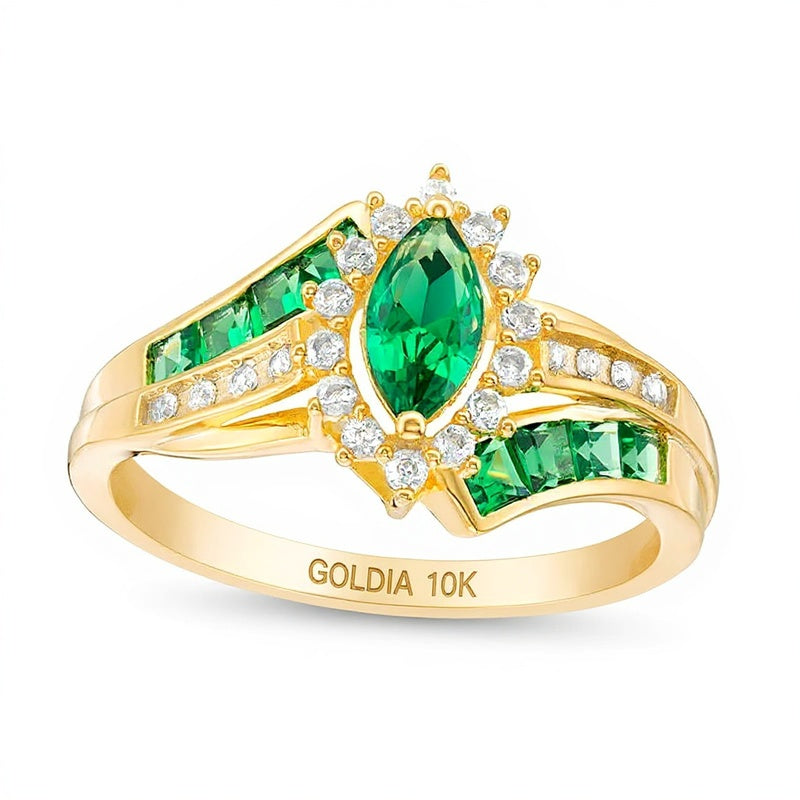 Ring mit Smaragd im Marquise-Schliff und Diamant im Princess-Schliff 0,17 ct. Gesamtgewicht in 10K Gelbgold