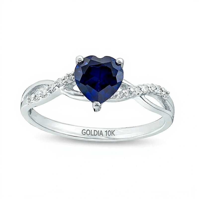Ring mit herzförmigem, im Labor gezüchtetem blauem Saphir 6,0 mm und Diamanten 0,05 ct. Gesamtgewicht in 10K Weißgold