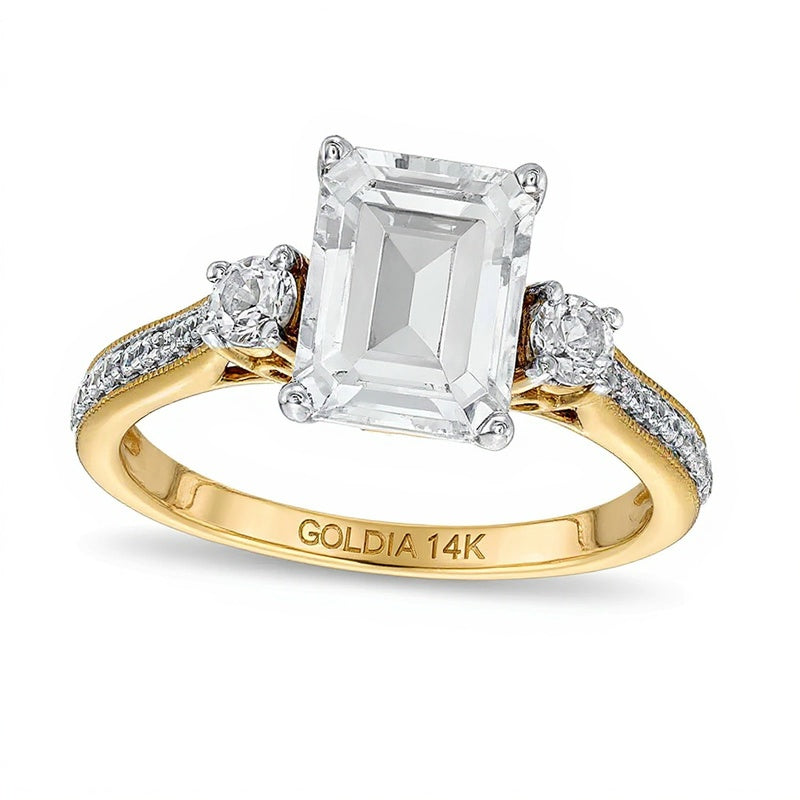 Dreistein-Verlobungsring mit weißem Labor-Saphir im Smaragdschliff und 0,1 ct. Gesamtgewicht Diamanten in 14K Gold