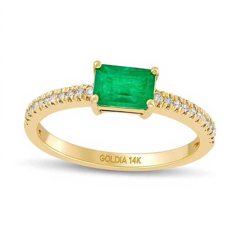 Solitär-Ring mit seitlichem Besatz mit Smaragd und 0.1 ct. Gesamtgewicht Diamanten in 14K Gelbgold