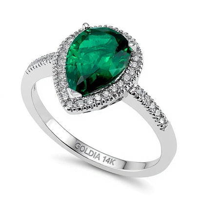 Halo-Ring mit tropfenförmigem Labor-Smaragd und 0,2 ct. Gesamtgewicht Diamanten in 14K Weißgold