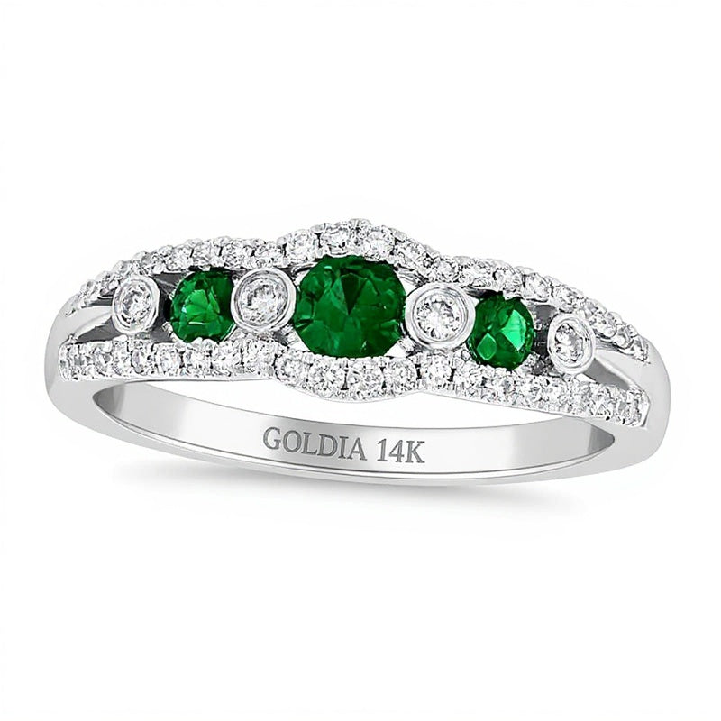 Memoire-Ring mit Smaragd und 0,25 ct. Gesamtgewicht Diamanten, Siebenstein, in 14K Weißgold