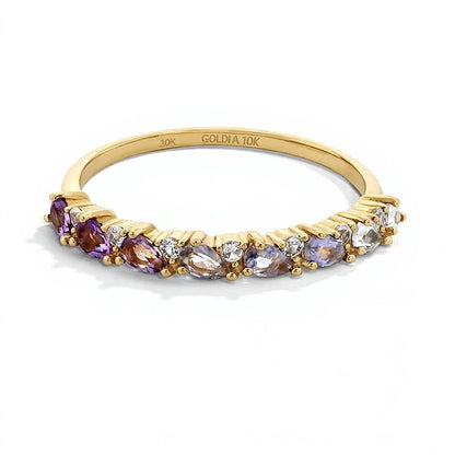 Ring mit Amethyst, Tansanit und weißem Saphir im Tropfenschliff in 10K Gelbgold