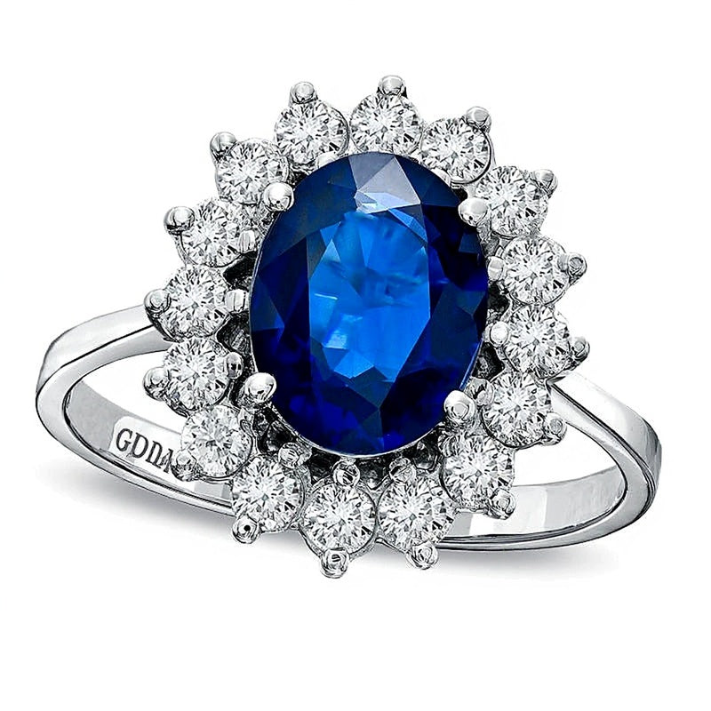 Halo-Ring mit ovalem blauem Saphir und 0,63 ct. Gesamtgewicht Diamanten in 14K Weißgold