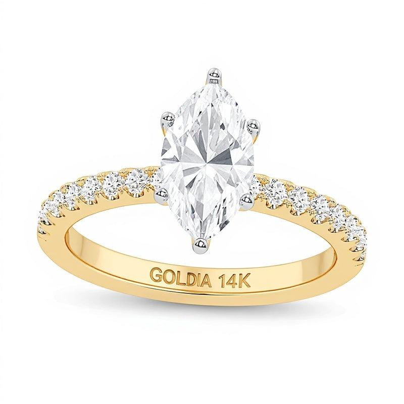 Solitär mit seitlichem Besatz mit Labordiamanten im Marquise- und Rundschliff 1.75 ct. Gesamtgewicht in 14K Gelbgold (F/VS2)