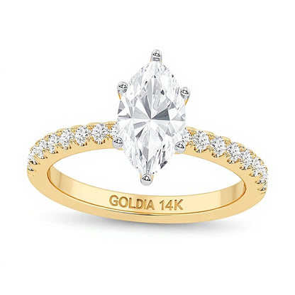Solitär mit seitlichem Besatz mit Labordiamanten im Marquise- und Rundschliff 1.75 ct. Gesamtgewicht in 14K Gelbgold (F/VS2)