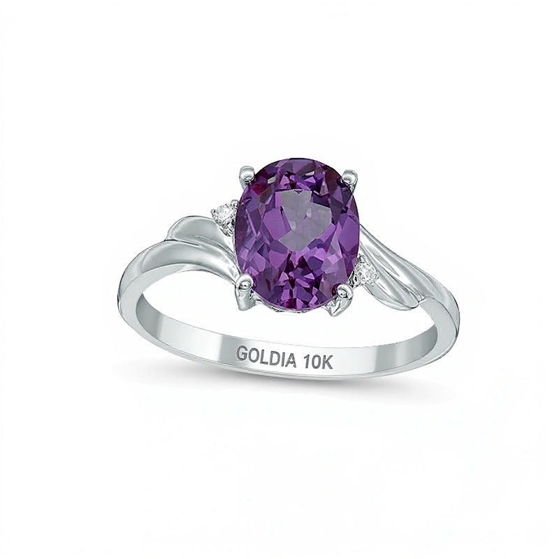Ring mit ovalem Alexandrit und Diamant-Besatz, Solitär mit seitlichem Besatz, Bypass-Design, in 10K Weißgold