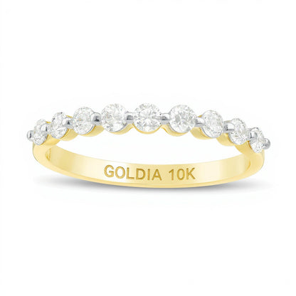 Memoire-Ring mit neun Diamanten 0,38 ct. Gesamtgewicht in 10K Gelbgold