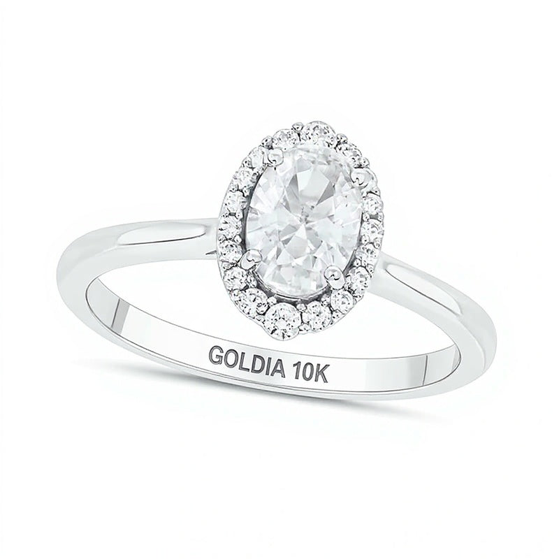 Verlobungsring mit ovalem weißem Labor-Saphir und 0,17 ct. Gesamtgewicht Diamanten in Halo-Fassung aus 10K Weißgold