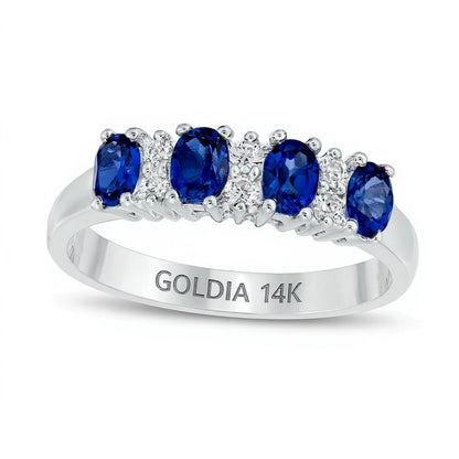 Ring mit ovalem blauem Saphir und Diamanten 0,1 ct. Gesamtgewicht im Vierstein-Wechseldesign in 14K Weißgold