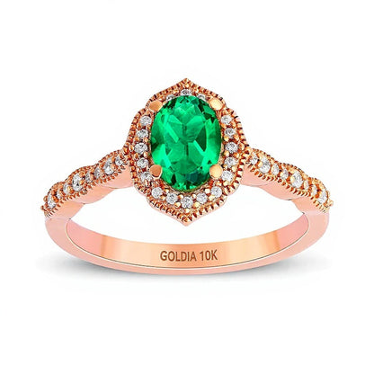 Halo-Ring im Vintage-Stil mit ovalem Smaragd und 0,17 ct. Gesamtgewicht Diamanten in 10K Roségold