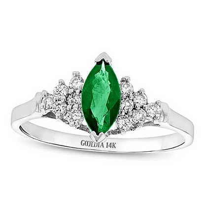 Solitär-Ring mit seitlichem Besatz mit Smaragd im Marquise-Schliff und Diamanten (0.2 ct. Gesamtgewicht) in 14K Weißgold