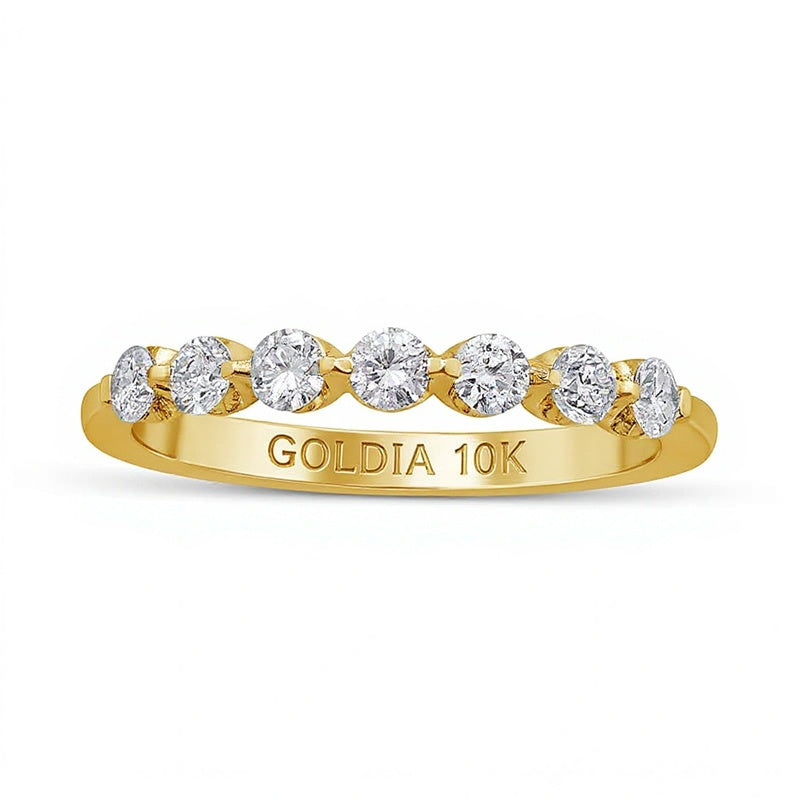 Memoire-Ring mit sieben Diamanten 0.5 ct. Gesamtgewicht in 10K Gelbgold