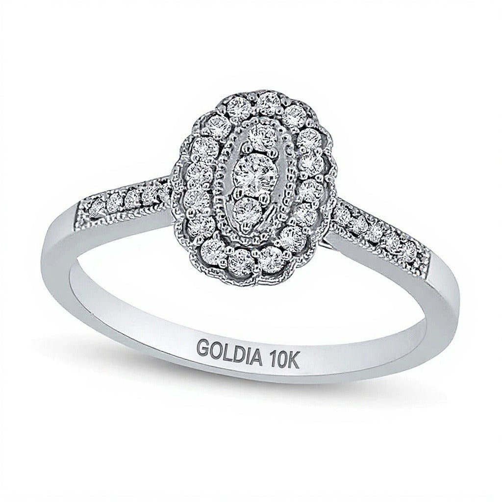 Vintage-Ring mit ovaler Diamant-Anordnung im Muschelrahmen 0,2 ct. Gesamtgewicht in 10K Weißgold