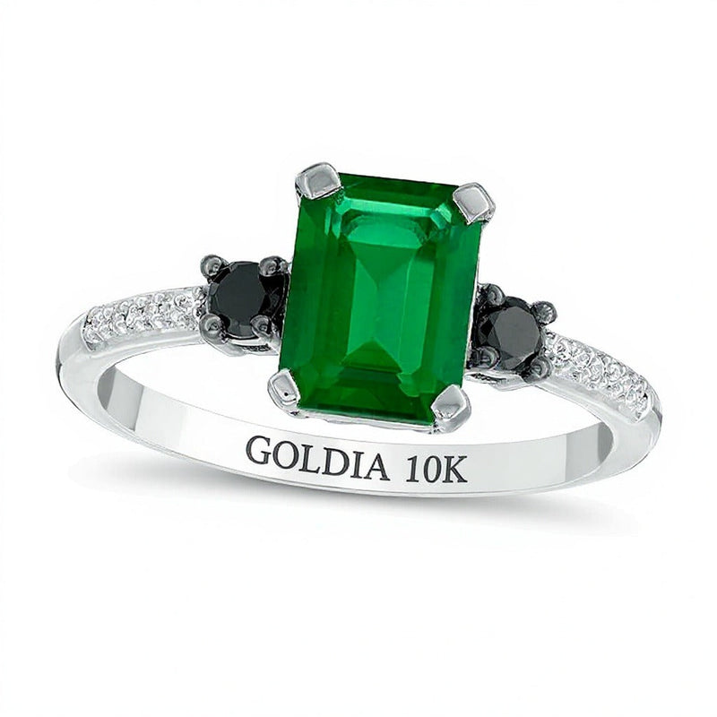 Dreistein-Ring mit Smaragd im Smaragdschliff (Labor) und schwarzen sowie weißen Diamanten 0,13 ct. Gesamtgewicht in 10K Weißgold