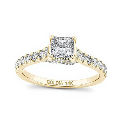 0.75 ct. Gesamtgewicht Solitär mit seitlichem Besatz mit Diamanten im Princess- und Rundschliff in 14K Gelbgold
