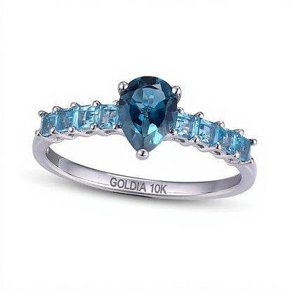 Ring mit tropfenförmigem London Blue Topaz und Swiss Blue Topaz im Princess-Schliff in 10K Weißgold