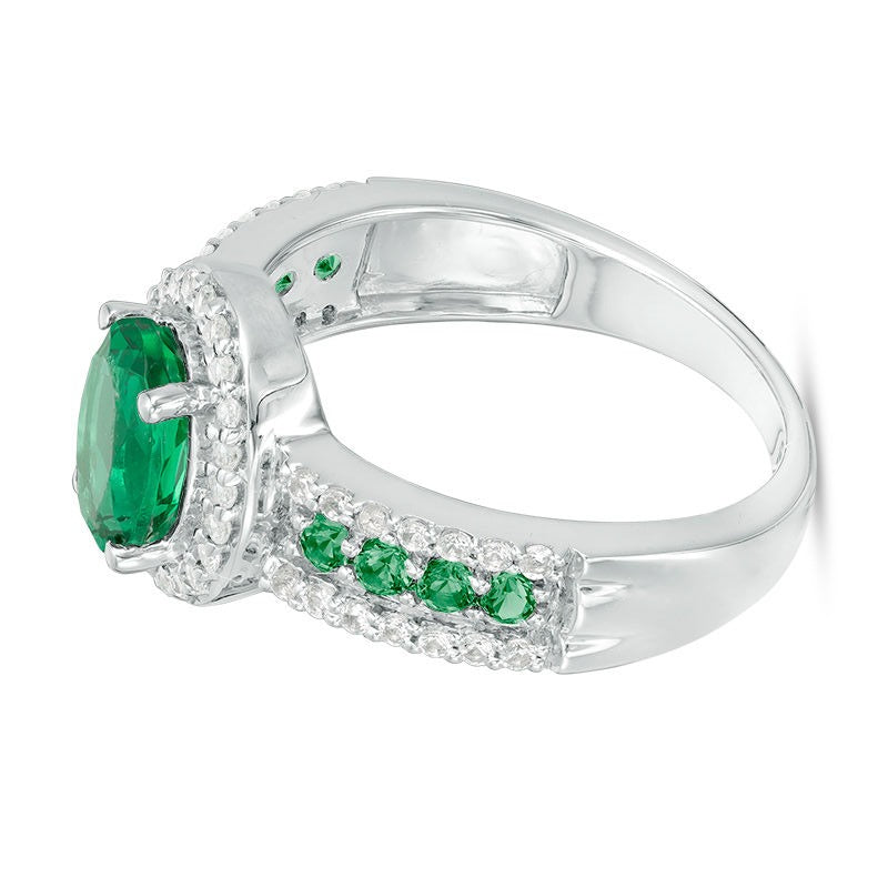 Halo-Ring mit ovalem Labor-Smaragd und weißen Saphiren in rhodiniertem Sterlingsilber