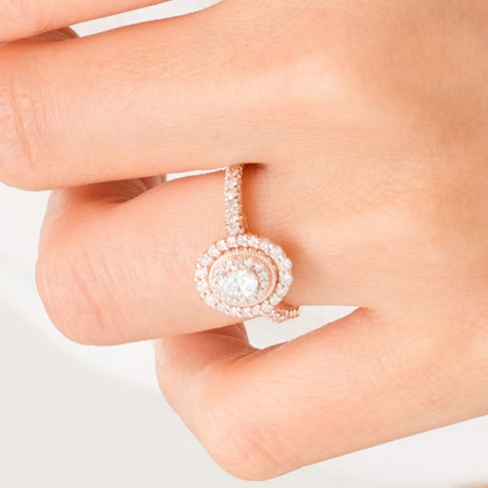 0.63 ct. Gesamtgewicht Halo-Verlobungsring im Vintage-Stil mit ovalem Diamant in 10K Roségold