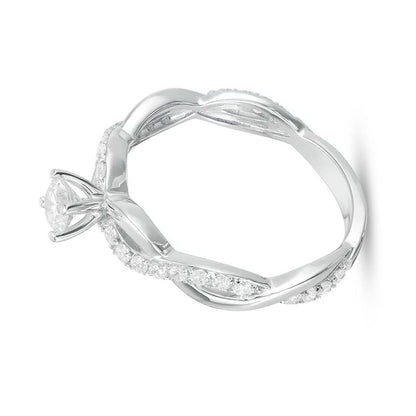 Solitär mit seitlichem Besatz mit Diamanten 1.0 ct. Gesamtgewicht in 14K Weißgold
