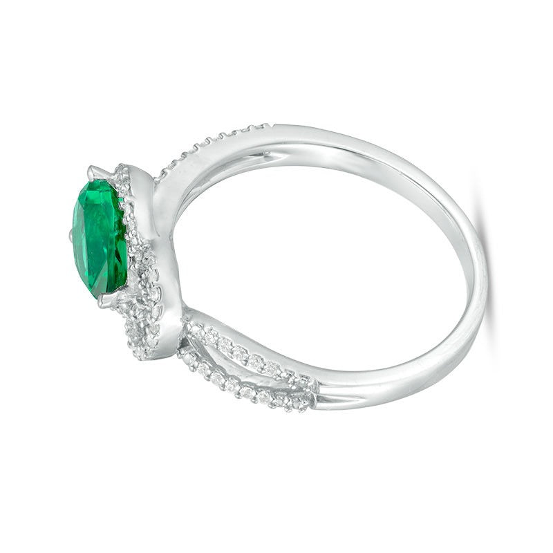 Fashion-Ring mit tropfenförmigem Labor-Smaragd und 0.17 ct. Gesamtgewicht Diamanten und Knoten-Rahmen in rhodiniertem Sterlingsilber