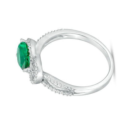 Fashion-Ring mit tropfenförmigem Labor-Smaragd und 0.17 ct. Gesamtgewicht Diamanten und Knoten-Rahmen in rhodiniertem Sterlingsilber
